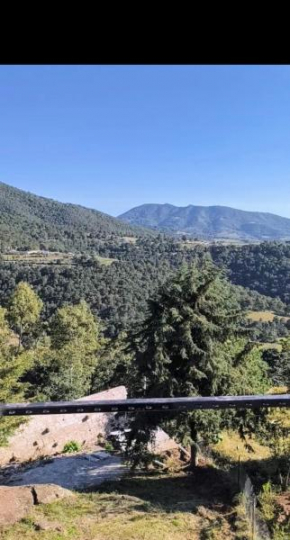 Casa con vista a la Montaña y cielo estrellado